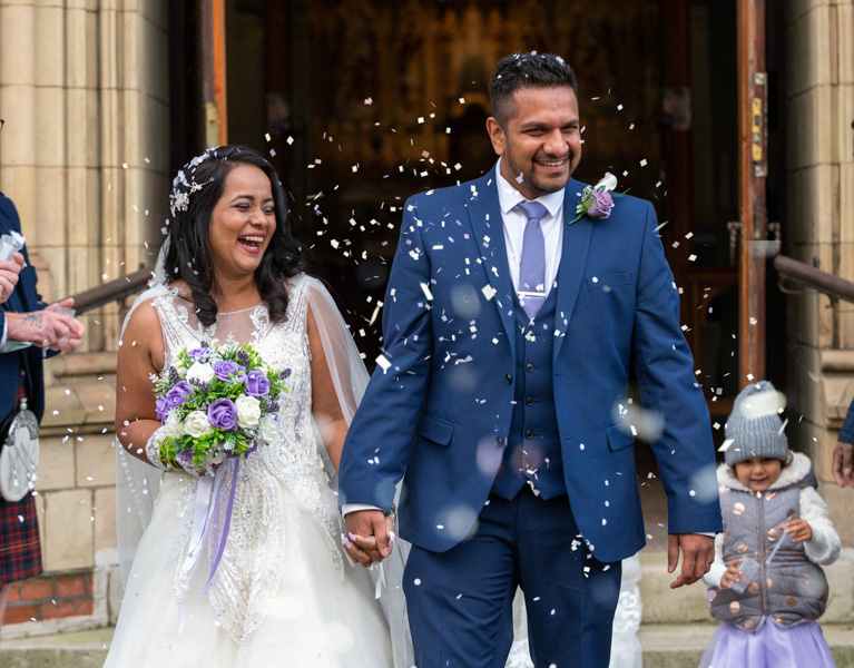 Wedding photographer catches happy couple